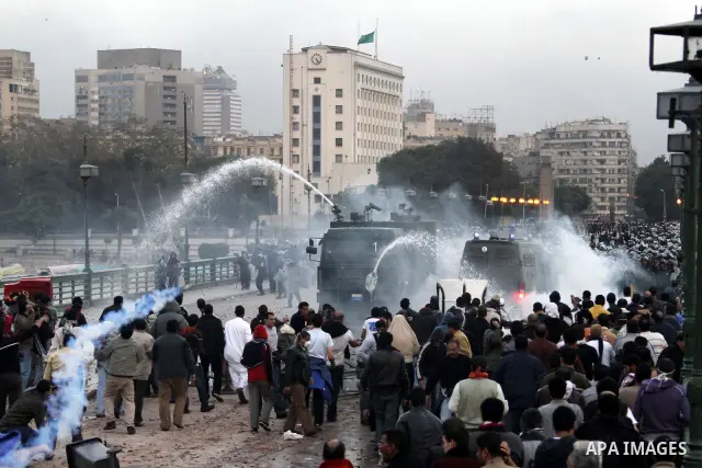 Egyptian policemen fire tear gas canisters towards anti-government protesters during a demonstration against president Hosni Mubarak regime in Tahrir, or Liberation Square in Cairo, Egypt, Jan. 29, 2011. Photo by Karam N...