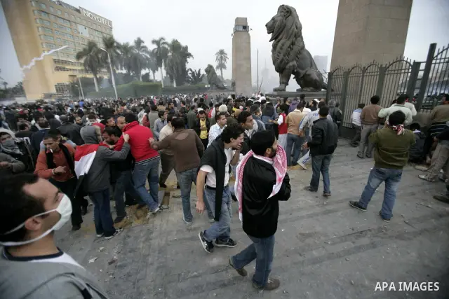 Egyptian policemen fire tear gas canisters towards anti-government protesters during a demonstration against president Hosni Mubarak regime in Tahrir, or Liberation Square in Cairo, Egypt, Jan. 29, 2011. Photo by Karam N...