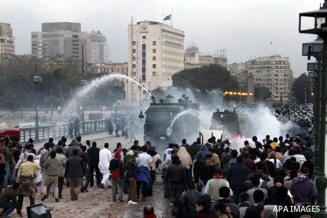 Egyptian policemen fire tear gas canisters towards anti-government protesters during a demonstration against president Hosni Mubarak regime in Tahrir, or Liberation Square in Cairo, Egypt, Jan. 29, 2011. Photo by Karam N...