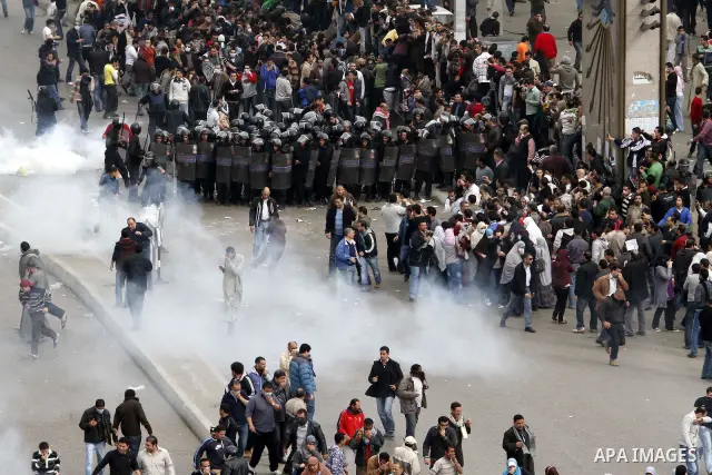 Egyptian policemen fire tear gas canisters towards anti-government protesters during a demonstration against president Hosni Mubarak regime in Tahrir, or Liberation Square in Cairo, Egypt, Jan. 29, 2011. Photo by Karam N...