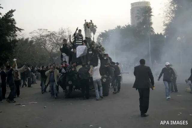 Egyptian policemen fire tear gas canisters towards anti-government protesters during a demonstration against president Hosni Mubarak regime in Tahrir, or Liberation Square in Cairo, Egypt, Jan. 29, 2011. Photo by Karam N...
