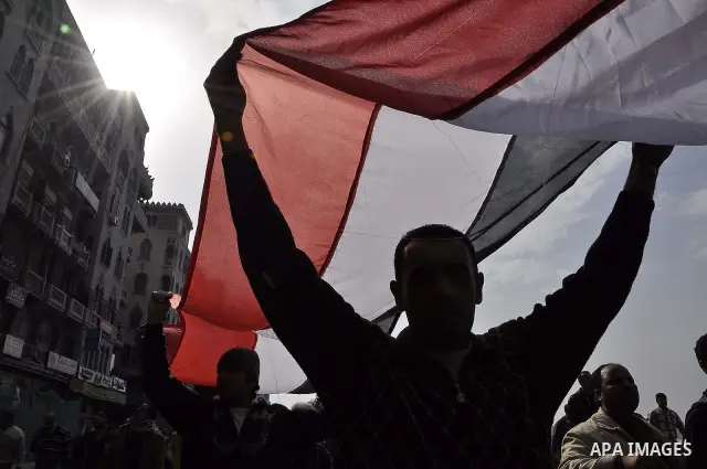 Anti-government demonstrators march in Alexandria, Egypt, Jan. 28, 2011. Egyptian President Hosni Mubarak defied a quarter-million protesters demanding he step down immediately, announcing he would serve out the last mon...