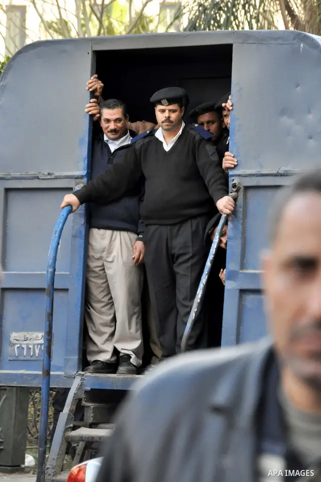 Egyptian police stand guard during fresh demonstrations that erupted following Friday prayers in Alexandria, Egypt, Jan. 28, 2011. Violent clashes marked a 'Friday of rage' in Egypt, as anti-government protesters sought...