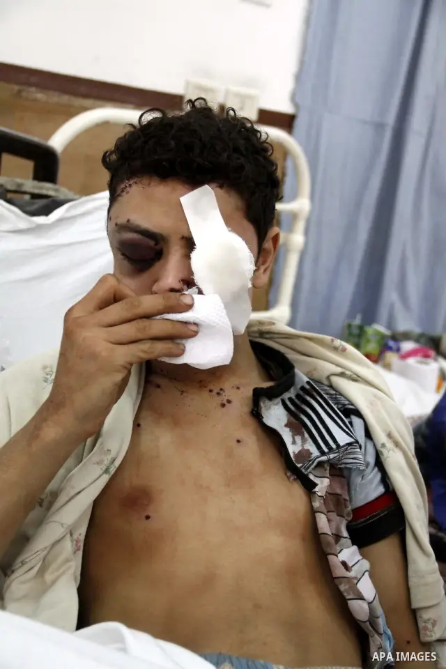 A wounded protester is being treated after being injured during clashes in Cairo's main square, Egypt, Thursday, Feb. 3, 2011. Egyptian army tanks and soldiers moved to end violence between anti-government protesters and...