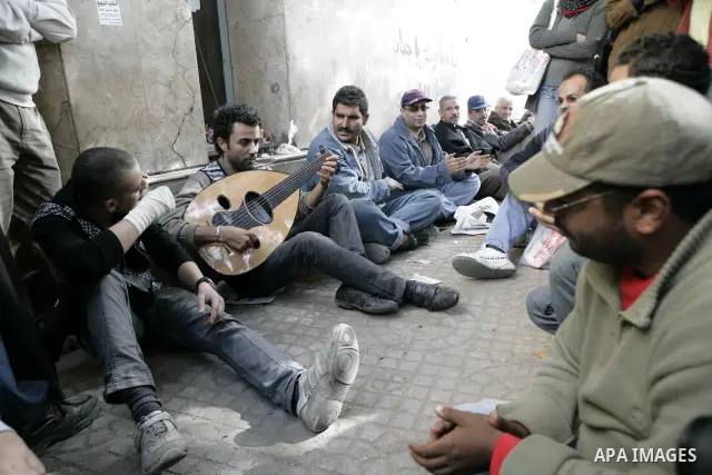 Protestors gather at Tahrir Square, Cairo, Egypt, Feb. 4, 2011. Egyptian minister of Health said Friday that about five thousand people have been injured since Jan. 25, and eight have been killed in clashes between prote...
