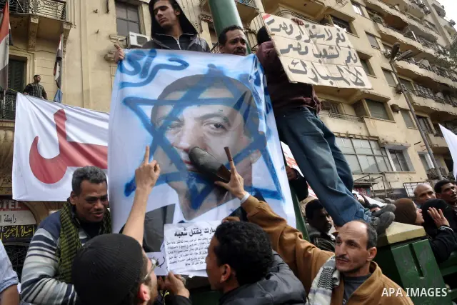 Protestors gather at Tahrir Square, Cairo, Egypt, Feb. 4, 2011. Egyptian minister of Health said Friday that about five thousand people have been injured since Jan. 25, and eight have been killed in clashes between prote...