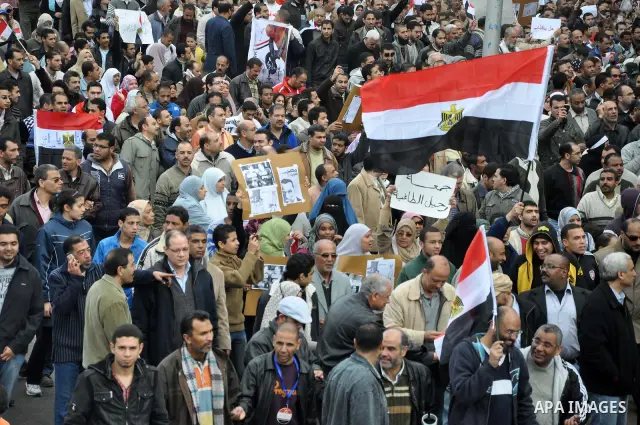Egyptian protester shouts anti-Mubarak slogans during a protest in the Mediterranean sea city of Alexandria, Egypt, Friday, Feb. 4, 2011. Tens of thousands packed central Cairo Friday, waving flags and singing the nation...