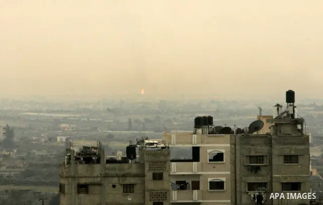 A fire is seen after an explosion went off at a gas terminal in Egypt's northern Sinai Peninsula on Saturday Feb. 5, 2011, setting off a massive fire along a gas pipeline that could be seen dozens of miles away, official...