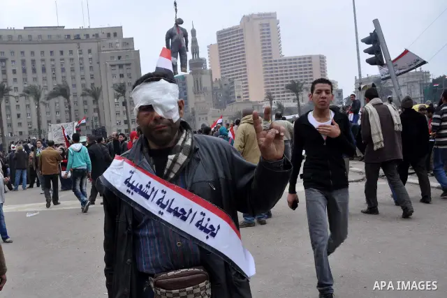 Egyptian anti-Mubarak protesters take part in a protest in Cairo, Egypt, Saturday, Feb. 5, 2011. President Barack Obama said Egypt's Hosni Mubarak should do the statesmanlike thing and make a quick handoff to a more repr...