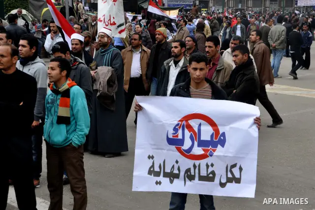 Egyptian anti-Mubarak protesters take part in a protest in Cairo, Egypt, Saturday, Feb. 5, 2011. President Barack Obama said Egypt's Hosni Mubarak should do the statesmanlike thing and make a quick handoff to a more repr...