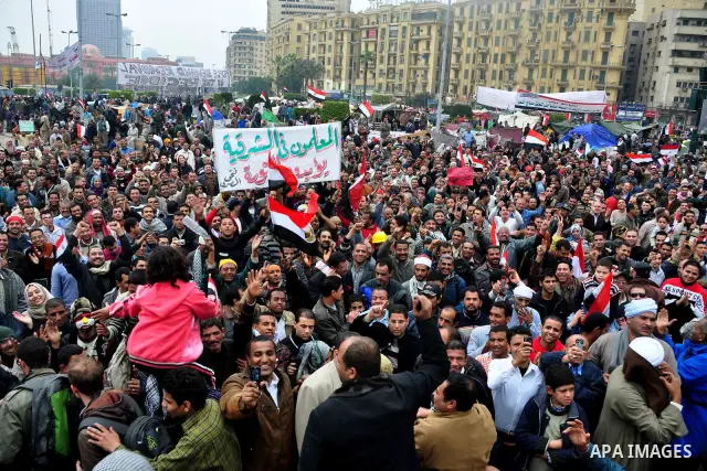 Egyptian anti-Mubarak protesters take part in a protest in Cairo, Egypt, Saturday, Feb. 5, 2011. President Barack Obama said Egypt's Hosni Mubarak should do the statesmanlike thing and make a quick handoff to a more repr...