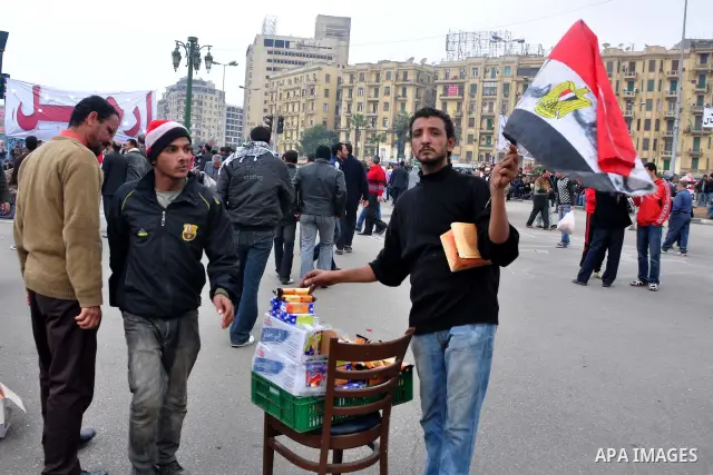 Egyptian anti-Mubarak protesters take part in a protest in Cairo, Egypt, Saturday, Feb. 5, 2011. President Barack Obama said Egypt's Hosni Mubarak should do the statesmanlike thing and make a quick handoff to a more repr...