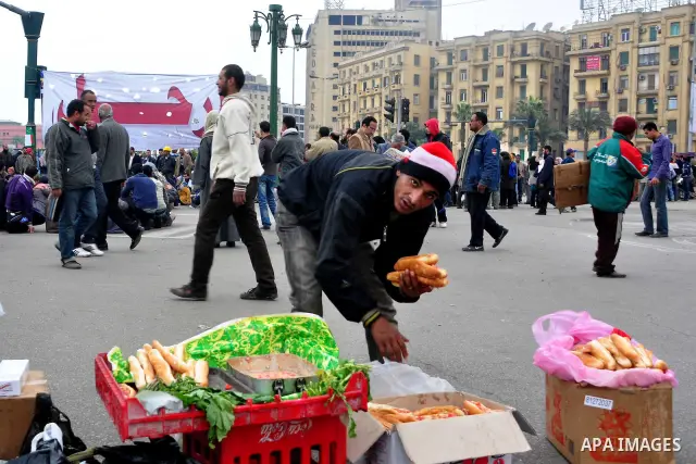 Egyptian anti-Mubarak protesters take part in a protest in Cairo, Egypt, Saturday, Feb. 5, 2011. President Barack Obama said Egypt's Hosni Mubarak should do the statesmanlike thing and make a quick handoff to a more repr...