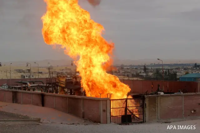Flames are seen after an explosion went off at a gas terminal in Egypt's northern Sinai Peninsula on Saturday, Feb. 5, 2011 in El-Arish, setting off a massive fire. No injuries were reported, and the blaze was quickly br...