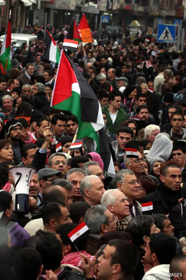 Palestinians demonstrate during a rally to show solidarity with anti-Mubarak protestors in Egypt, during a demonstration in the West Bank city of Ramallah, Saturday, Feb. 5, 2011. Photo by Issam Rimawi
