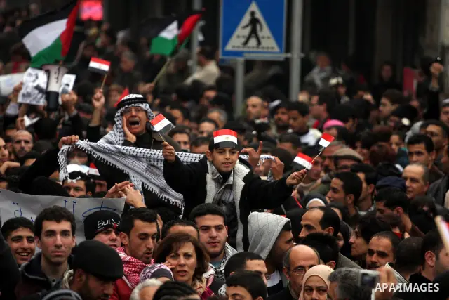 Palestinians demonstrate during a rally to show solidarity with anti-Mubarak protestors in Egypt, during a demonstration in the West Bank city of Ramallah, Saturday, Feb. 5, 2011. Photo by Issam Rimawi