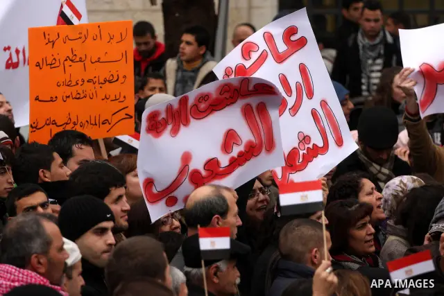 Palestinians demonstrate during a rally to show solidarity with anti-Mubarak protestors in Egypt, during a demonstration in the West Bank city of Ramallah, Saturday, Feb. 5, 2011. Photo by Issam Rimawi