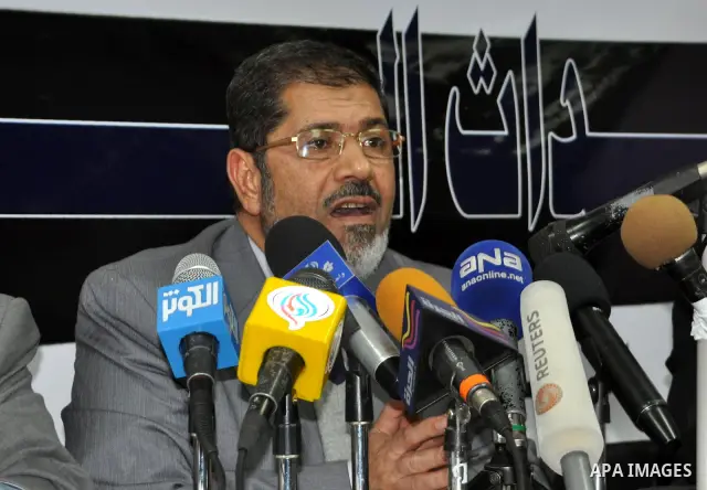 Egyptian Muslim Brotherhood spokesman Mohamed Morsi talks during a press conference in Cairo, Egypt, Sunday, Feb. 6, 2011. Egypt's largest opposition group, the Muslim Brotherhood, said it would begin talks Sunday with t...