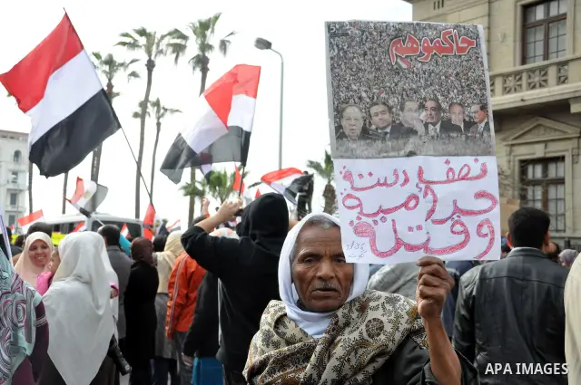 Egyptian protesters take part in a protest called 'Sunday of the martyrs' in Alexandria, Egypt, 06 February 2011. Anti-government protests entered its 13th straight day in Egypt, as solutions were being mulled to bring a...