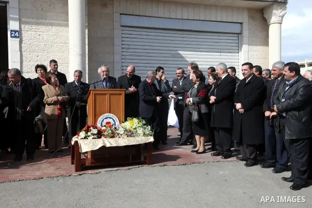 Palestinian Prime Minister Salam Fayyad puts the corner stone for the Evangelical Lutheran School in the West Bank city of Ramallah on Feb. 7,2011. Photo by Mustafa Abu Dayeh