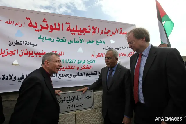 Palestinian Prime Minister Salam Fayyad puts the corner stone for the Evangelical Lutheran School in the West Bank city of Ramallah on Feb. 7,2011. Photo by Mustafa Abu Dayeh