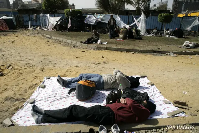 Egyptian anti-government protesters sleep in Tahrir Square in Cairo, Egypt, Monday, Feb. 7, 2011. The protests, which saw tens of thousands of people massing daily in downtown Cairo for demonstrations that at times turne...