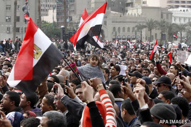 Egyptian anti-government protesters demonstrate in Tahrir Square in Cairo, Egypt, Monday, Feb. 7, 2011. The protests, which saw tens of thousands of people massing daily in downtown Cairo for demonstrations that at times...