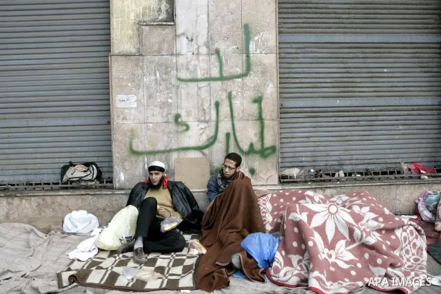 Egyptian anti-government protesters sleep in Tahrir Square in Cairo, Egypt, Monday, Feb. 7, 2011. The protests, which saw tens of thousands of people massing daily in downtown Cairo for demonstrations that at times turne...