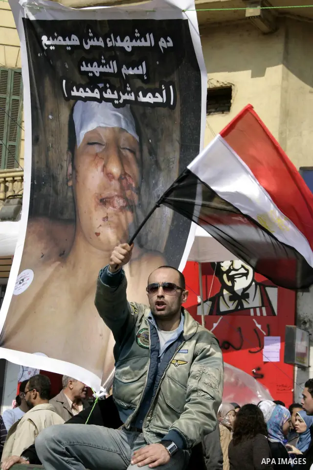 Anti-government protesters take part in demonstrations in Tahrir Square in downtown Cairo, Egypt, Tuesday, Feb. 8, 2011. Protesters appear to have settled in for a long standoff, turning Tahrir Square into a makeshift vi...