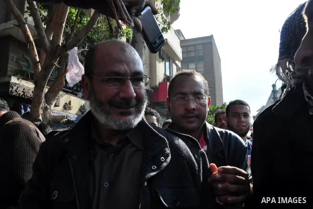 Anti-government protesters take part in demonstrations in Tahrir Square in downtown Cairo, Egypt, Tuesday, Feb. 8, 2011. Protesters appear to have settled in for a long standoff, turning Tahrir Square into a makeshift vi...