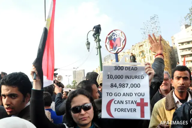 Anti-government protesters take part in demonstrations in Tahrir Square in downtown Cairo, Egypt, Tuesday, Feb. 8, 2011. Protesters appear to have settled in for a long standoff, turning Tahrir Square into a makeshift vi...