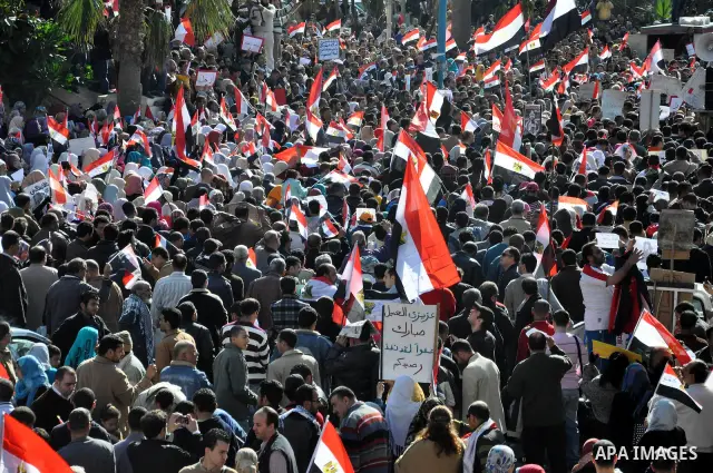 Egyptian anti government protesters gather in Alexandria, Egypt, on 08 February 2011, the 15th consecutive day of thousands of people protesting against Egypt's president Hosni Mubarak. Photo by Ahmed Ramadan