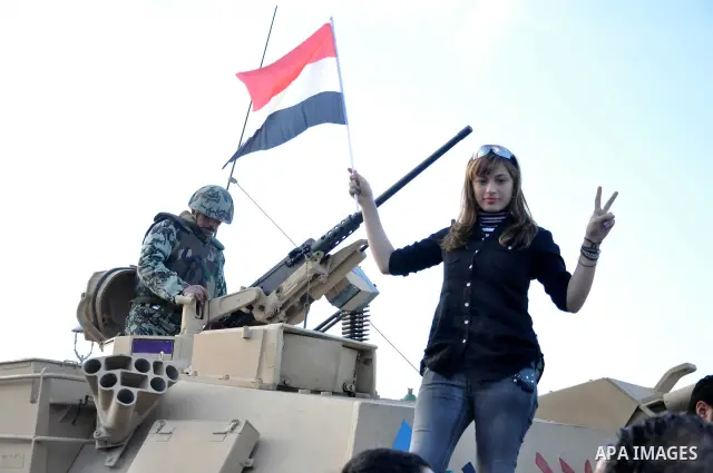 Egyptian anti government protesters gather in Alexandria, Egypt, on 08 February 2011, the 15th consecutive day of thousands of people protesting against Egypt's president Hosni Mubarak. Photo by Ahmed Ramadan