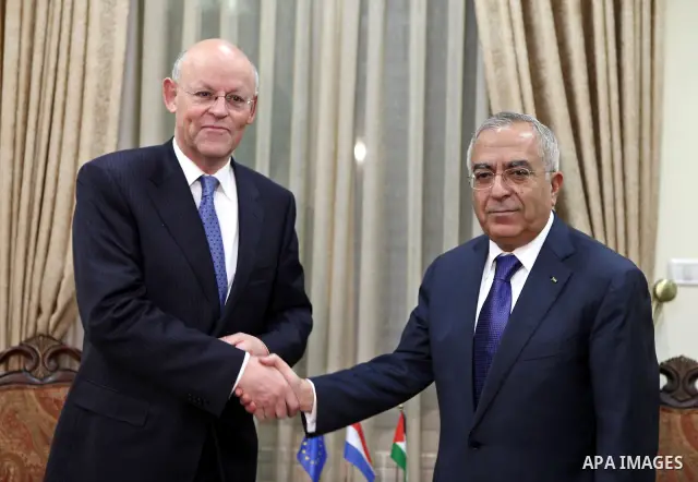 Palestinian Prime Minister Salam Fayyad during his meeting with the Netherland Minister of Foreign Affairs, Uri Rosenthal in the West Bank city of Ramallah on Feb. 9,2011. Photo by Mustafa Abu Dayeh