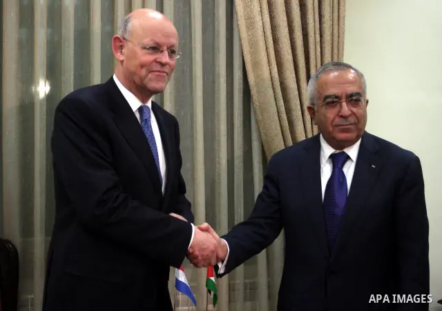Palestinian Prime Minister Salam Fayyad during his meeting with the Netherland Minister of Foreign Affairs, Uri Rosenthal in the West Bank city of Ramallah on Feb. 9,2011. Photo by Issam Rimawi