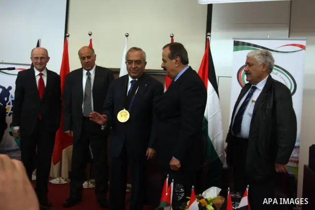 Palestinian Prime Minister Salam Fayyad attends the opening of the Arab Media Forum Sports first in Palestine in West Bank city of Ramallah on February 9, 2011. Photo by Issam Rimawi
