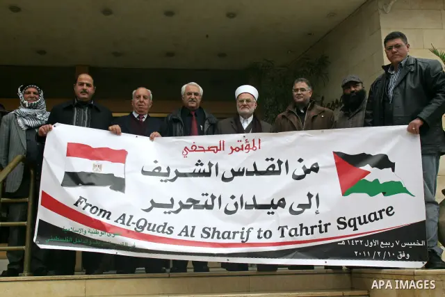 Palestinians attend a press conference to solidarity with the Egyptian people, in Jerusalem, on Feb. 10,2011. Photo by Mahfouz Abu Turk