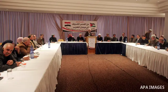Palestinians attend a press conference to solidarity with the Egyptian people, in Jerusalem, on Feb. 10,2011. Photo by Mahfouz Abu Turk