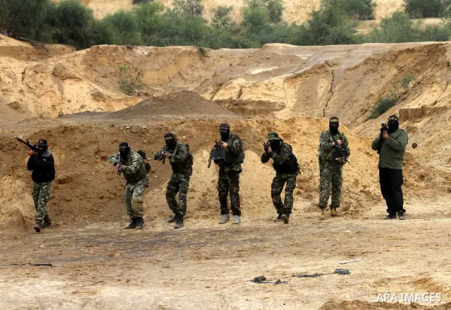 Palestinian Islamic Jihad militants participate in a training session in the outskirts of Khan Younis, southern Gaza Strip, Thursday, Feb. 10, 2011. Islamic Jihad carried out dozens of suicide bombings and other attacks...