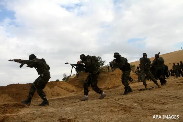 Palestinian Islamic Jihad militants participate in a training session in the outskirts of Khan Younis, southern Gaza Strip, Thursday, Feb. 10, 2011. Islamic Jihad carried out dozens of suicide bombings and other attacks...