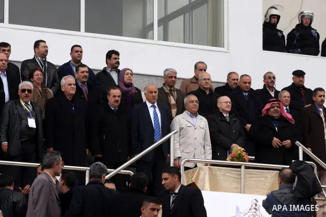 Palestinian prime minister Salam Fayyad participates the opening soccer match of the Palestinian women's soccer league between Siryah Ramallah and Deyar in the West Bank town of Aram, near Ramallah, Thursday, Feb. 10, 20...