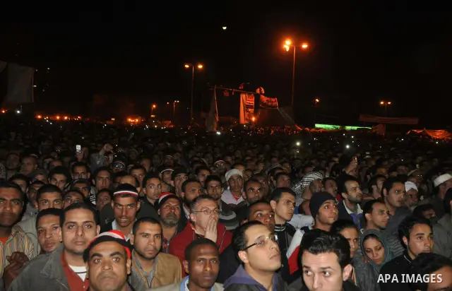 Anti-government protesters react as Egyptian President Hosni Mubarak makes a televised statement to his nation in Tahrir Square in downtown Cairo, Egypt Thursday, Feb. 10, 2011. Photo by Ahmed Asad