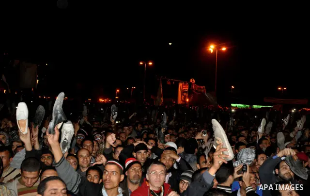 nti-government protesters hold their shoes as they react with to Egyptian President Hosni Mubarak's televised statement to his nation in Tahrir Square in downtown Cairo, Egypt Thursday, Feb. 10, 2011. Egyptian President...