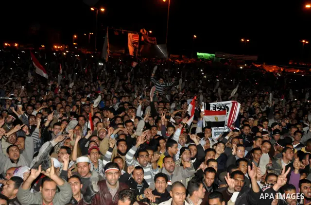 Anti-government protesters react as Egyptian President Hosni Mubarak makes a televised statement to his nation in Tahrir Square in downtown Cairo, Egypt Thursday, Feb. 10, 2011. Photo by Ahmed Asad
