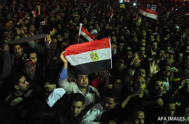 Anti-government protesters react as Egyptian President Hosni Mubarak makes a televised statement to his nation in Tahrir Square in downtown Cairo, Egypt Thursday, Feb. 10, 2011. Photo by Ahmed Asad