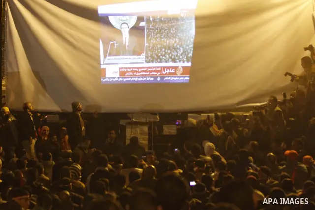 nti-government protesters watch on big screen as Egyptian President Hosni Mubarak makes a televised statement to his nation in Tahrir Square in downtown Cairo, Egypt Thursday, Feb. 10, 2011. Egyptian President Hosni Muba...