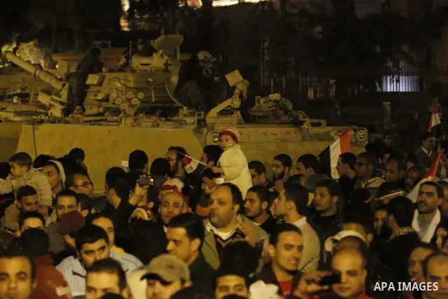 nti-government protesters watch on big screen as Egyptian President Hosni Mubarak makes a televised statement to his nation in Tahrir Square in downtown Cairo, Egypt Thursday, Feb. 10, 2011. Egyptian President Hosni Muba...