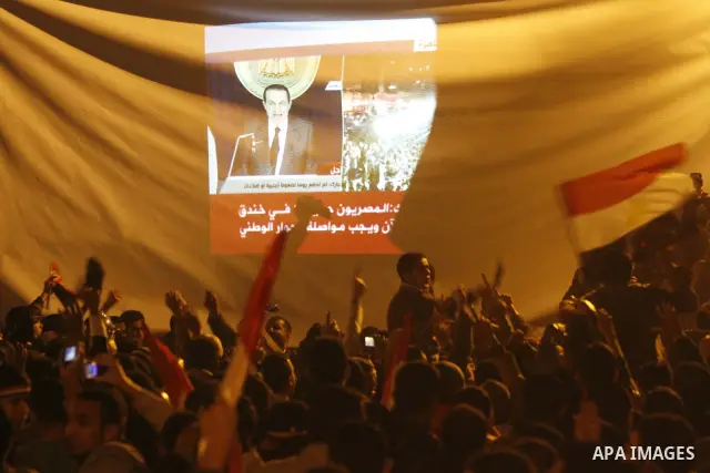 nti-government protesters watch on big screen as Egyptian President Hosni Mubarak makes a televised statement to his nation in Tahrir Square in downtown Cairo, Egypt Thursday, Feb. 10, 2011. Egyptian President Hosni Muba...