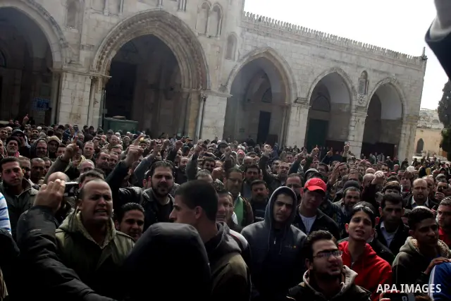 Palestinians rally in support of the Egyptian people and calling for the ouster of Egyptian President Hosni Mubarak at the Al-Aqsa Mosque compound in Jerusalem's Old City on February 11, 2011. Photo by Mahfouz Abu Turk