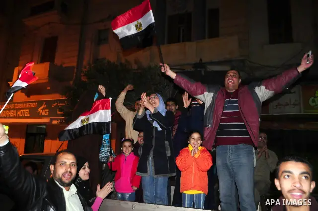 Egyptians celebrate the resignation of President Hosni Mubarak in Alexandria, Egypt, Feb. 11, 2011. Egypt's President Hosni Mubarak steps down and the military take charge of the country, Egypt's Vice President Omar Sule...